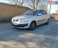 Серый Киа Рио, объемом двигателя 1.4 л и пробегом 240 тыс. км за 4100 $, фото 3 на Automoto.ua