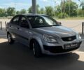 Серый Киа Рио, объемом двигателя 1.4 л и пробегом 243 тыс. км за 4200 $, фото 2 на Automoto.ua