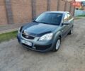 Серый Киа Рио, объемом двигателя 1.4 л и пробегом 211 тыс. км за 4700 $, фото 1 на Automoto.ua