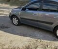 Серый Киа Рио, объемом двигателя 1.4 л и пробегом 182 тыс. км за 5200 $, фото 1 на Automoto.ua
