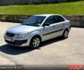 Серый Киа Рио, объемом двигателя 1.4 л и пробегом 242 тыс. км за 3600 $, фото 1 на Automoto.ua