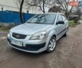 Серый Киа Рио, объемом двигателя 1.4 л и пробегом 113 тыс. км за 4550 $, фото 1 на Automoto.ua
