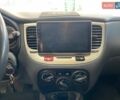 Серый Киа Рио, объемом двигателя 1.4 л и пробегом 98 тыс. км за 5990 $, фото 23 на Automoto.ua