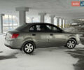 Серый Киа Рио, объемом двигателя 1.4 л и пробегом 99 тыс. км за 5500 $, фото 4 на Automoto.ua