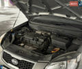 Серый Киа Рио, объемом двигателя 1.4 л и пробегом 99 тыс. км за 5500 $, фото 12 на Automoto.ua
