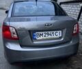 Серый Киа Рио, объемом двигателя 1.4 л и пробегом 99 тыс. км за 5500 $, фото 1 на Automoto.ua