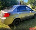 Серый Киа Рио, объемом двигателя 1.4 л и пробегом 167 тыс. км за 5400 $, фото 2 на Automoto.ua