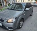 Сірий Кіа Ріо, об'ємом двигуна 1.4 л та пробігом 125 тис. км за 4700 $, фото 1 на Automoto.ua