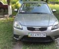 Серый Киа Рио, объемом двигателя 1.4 л и пробегом 215 тыс. км за 5200 $, фото 1 на Automoto.ua