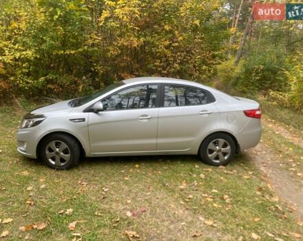 Серый Киа Рио, объемом двигателя 1.4 л и пробегом 224 тыс. км за 5400 $, фото 1 на Automoto.ua