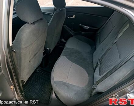 Сірий Кіа Ріо, об'ємом двигуна 1.4 л та пробігом 170 тис. км за 7000 $, фото 3 на Automoto.ua