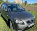Серый Киа Рио, объемом двигателя 1.4 л и пробегом 208 тыс. км за 5400 $, фото 1 на Automoto.ua