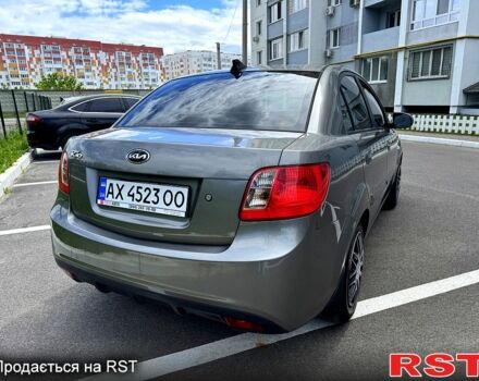 Сірий Кіа Ріо, об'ємом двигуна 1.4 л та пробігом 189 тис. км за 5200 $, фото 3 на Automoto.ua