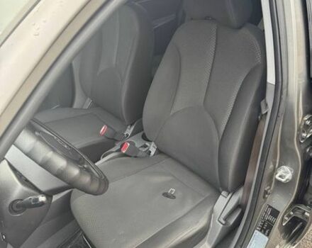 Серый Киа Рио, объемом двигателя 1.4 л и пробегом 135 тыс. км за 6999 $, фото 12 на Automoto.ua