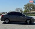 Серый Киа Рио, объемом двигателя 1.4 л и пробегом 135 тыс. км за 4999 $, фото 5 на Automoto.ua