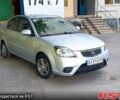Сірий Кіа Ріо, об'ємом двигуна 1.4 л та пробігом 154 тис. км за 5500 $, фото 4 на Automoto.ua