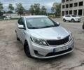 Сірий Кіа Ріо, об'ємом двигуна 1.4 л та пробігом 257 тис. км за 5600 $, фото 1 на Automoto.ua