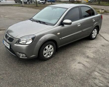 Серый Киа Рио, объемом двигателя 1.4 л и пробегом 135 тыс. км за 6999 $, фото 2 на Automoto.ua