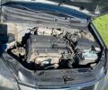 Серый Киа Рио, объемом двигателя 1.4 л и пробегом 208 тыс. км за 5400 $, фото 3 на Automoto.ua