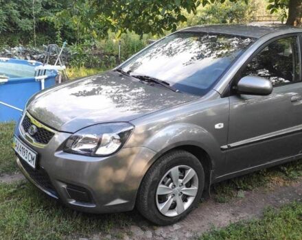 Сірий Кіа Ріо, об'ємом двигуна 1.4 л та пробігом 215 тис. км за 4994 $, фото 1 на Automoto.ua