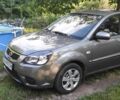 Сірий Кіа Ріо, об'ємом двигуна 1.4 л та пробігом 215 тис. км за 4994 $, фото 1 на Automoto.ua