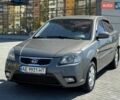 Серый Киа Рио, объемом двигателя 1.4 л и пробегом 135 тыс. км за 4999 $, фото 1 на Automoto.ua