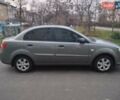Серый Киа Рио, объемом двигателя 1.4 л и пробегом 145 тыс. км за 4500 $, фото 2 на Automoto.ua