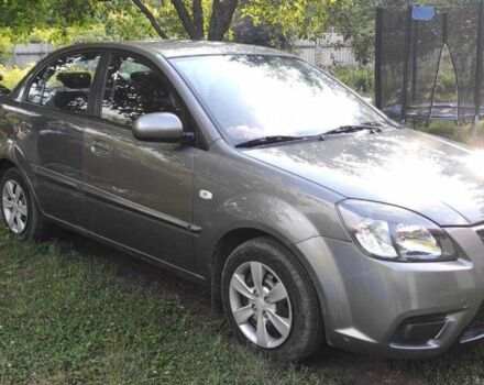 Сірий Кіа Ріо, об'ємом двигуна 1.4 л та пробігом 215 тис. км за 4994 $, фото 4 на Automoto.ua