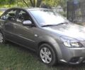 Сірий Кіа Ріо, об'ємом двигуна 1.4 л та пробігом 215 тис. км за 4994 $, фото 4 на Automoto.ua