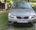 Сірий Кіа Ріо, об'ємом двигуна 1.4 л та пробігом 215 тис. км за 4994 $, фото 2 на Automoto.ua