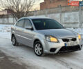 Серый Киа Рио, объемом двигателя 1.4 л и пробегом 228 тыс. км за 4550 $, фото 1 на Automoto.ua
