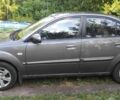 Серый Киа Рио, объемом двигателя 1.4 л и пробегом 215 тыс. км за 5200 $, фото 1 на Automoto.ua