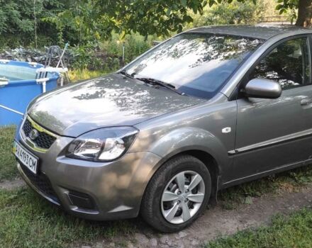 Сірий Кіа Ріо, об'ємом двигуна 1.4 л та пробігом 215 тис. км за 5200 $, фото 1 на Automoto.ua
