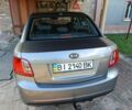 Серый Киа Рио, объемом двигателя 1.4 л и пробегом 160 тыс. км за 5116 $, фото 5 на Automoto.ua