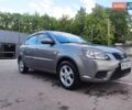 Серый Киа Рио, объемом двигателя 1.4 л и пробегом 226 тыс. км за 5200 $, фото 2 на Automoto.ua