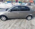 Серый Киа Рио, объемом двигателя 1.4 л и пробегом 271 тыс. км за 5000 $, фото 3 на Automoto.ua