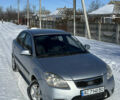 Серый Киа Рио, объемом двигателя 1.4 л и пробегом 196 тыс. км за 4500 $, фото 1 на Automoto.ua