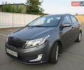 Серый Киа Рио, объемом двигателя 1.59 л и пробегом 191 тыс. км за 6600 $, фото 2 на Automoto.ua