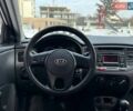 Серый Киа Рио, объемом двигателя 1.4 л и пробегом 89 тыс. км за 4900 $, фото 16 на Automoto.ua