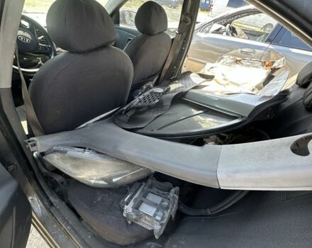 Серый Киа Рио, объемом двигателя 1.4 л и пробегом 244 тыс. км за 1499 $, фото 7 на Automoto.ua