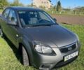 Сірий Кіа Ріо, об'ємом двигуна 1.4 л та пробігом 208 тис. км за 5400 $, фото 1 на Automoto.ua