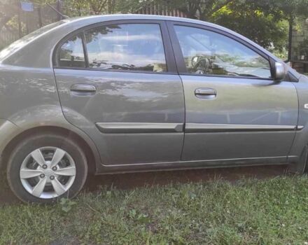 Сірий Кіа Ріо, об'ємом двигуна 1.4 л та пробігом 215 тис. км за 4994 $, фото 3 на Automoto.ua