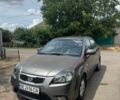 Серый Киа Рио, объемом двигателя 1.4 л и пробегом 92 тыс. км за 3700 $, фото 1 на Automoto.ua