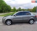 Серый Киа Рио, объемом двигателя 1.4 л и пробегом 226 тыс. км за 5200 $, фото 3 на Automoto.ua