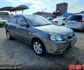 Сірий Кіа Ріо, об'ємом двигуна 1.4 л та пробігом 214 тис. км за 5700 $, фото 1 на Automoto.ua