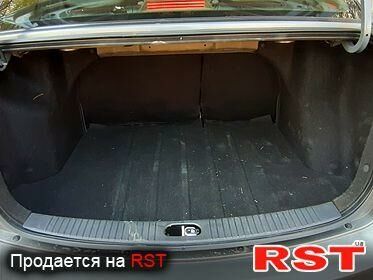 Серый Киа Рио, объемом двигателя 1.4 л и пробегом 68 тыс. км за 6600 $, фото 4 на Automoto.ua