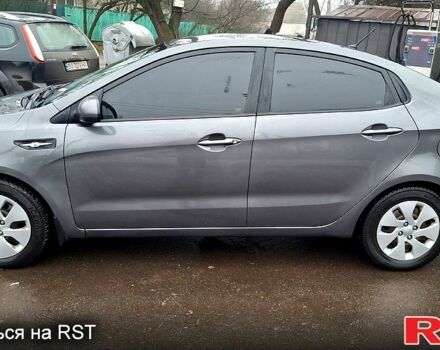 Серый Киа Рио, объемом двигателя 1.4 л и пробегом 243 тыс. км за 5700 $, фото 1 на Automoto.ua