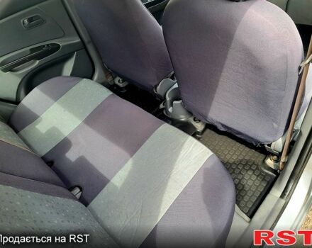 Серый Киа Рио, объемом двигателя 1.4 л и пробегом 174 тыс. км за 6000 $, фото 6 на Automoto.ua