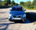 Серый Киа Рио, объемом двигателя 1.4 л и пробегом 235 тыс. км за 4000 $, фото 1 на Automoto.ua