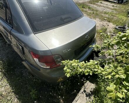 Серый Киа Рио, объемом двигателя 1.4 л и пробегом 244 тыс. км за 1499 $, фото 1 на Automoto.ua